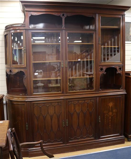 A large Edwardian inlaid mahogany bookcase W.210cm approx.
